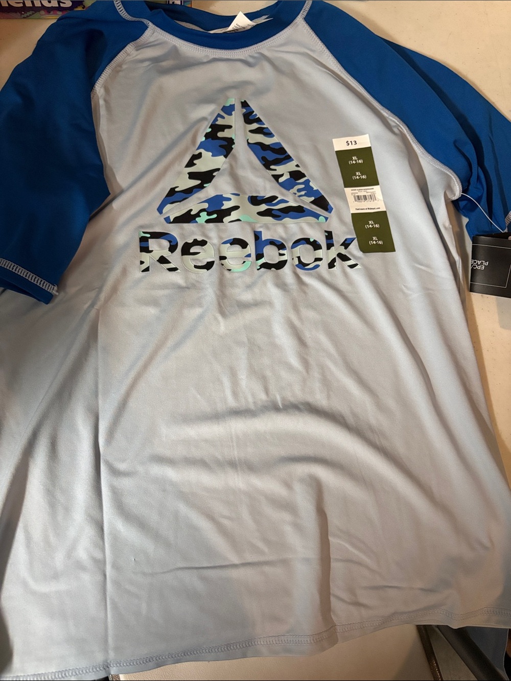 Reebok Light Blue Rashguard with Royal Blue Sleeves and Camo Logo